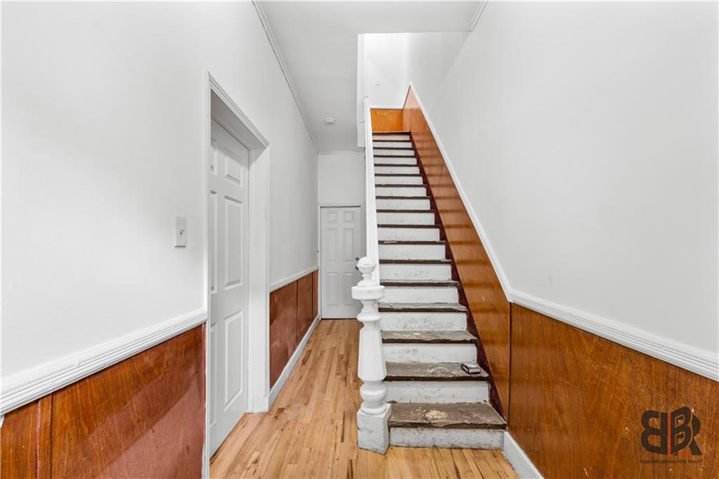 284 MacDougal Street Brooklyn, NY 11233 - Photo 15 of 23 a view of entryway with wooden floor