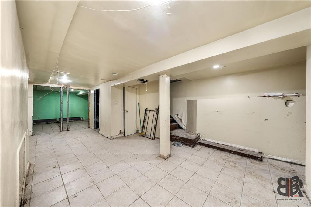 284 MacDougal Street Brooklyn, NY 11233 - Photo 19 of 23 a view of a room with gym equipment