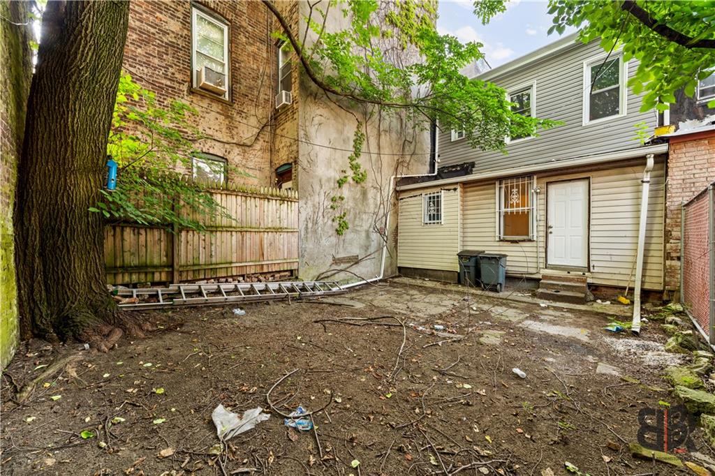 284 MacDougal Street Brooklyn, NY 11233 - Photo 22 of 23 a view of a house with a yard