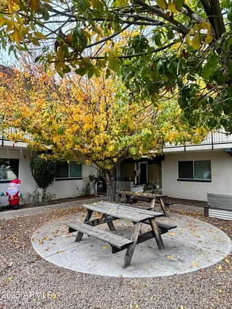 a view of a backyard with a patio