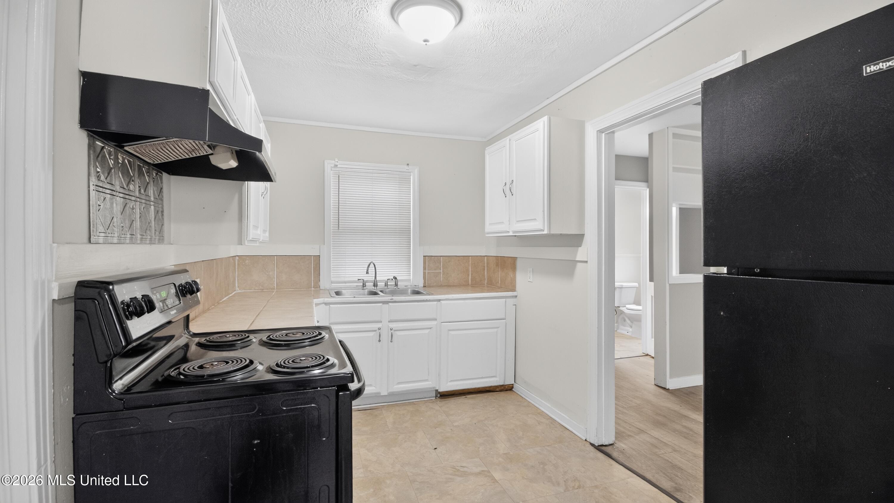 609 Launcelot Road Jackson, MS 39206 - Photo 13 of 30 16_609_Launcelot_Rd-Kitchen-0406