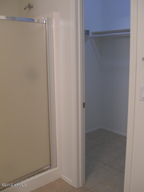 10422 East Bonnell Street Apache Junction, AZ 85120 - Photo 14 of 15 a bathroom with a shower