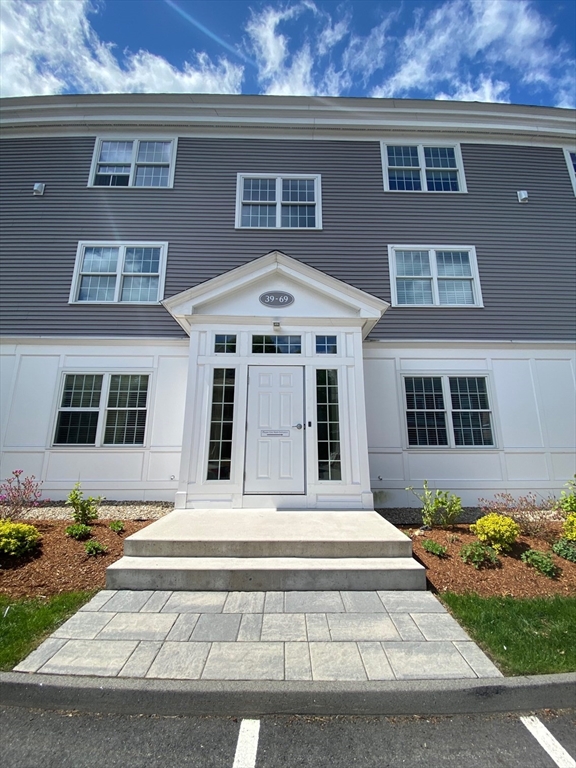 47 Saunders Street, Unit 47 North Andover, MA 01845 - Photo 11 of 11 a front view of a house