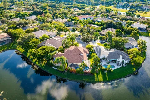 a view of a lake in front of the house