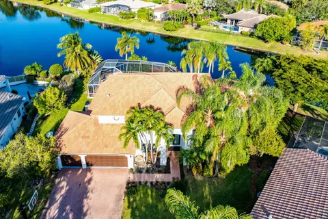 a view of swimming pool with a yard