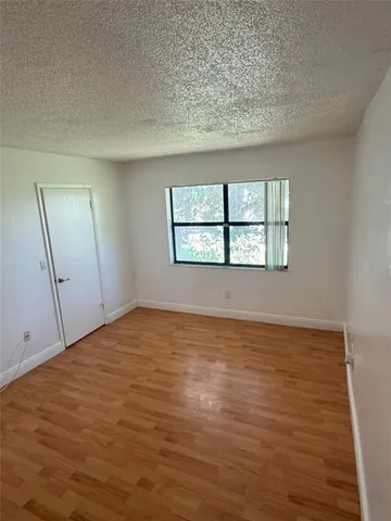 a view of an empty room with window