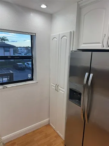 a view of walk in closet with window