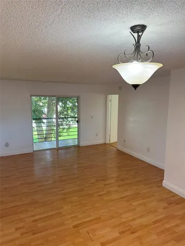 a view of a room with a sink and a window