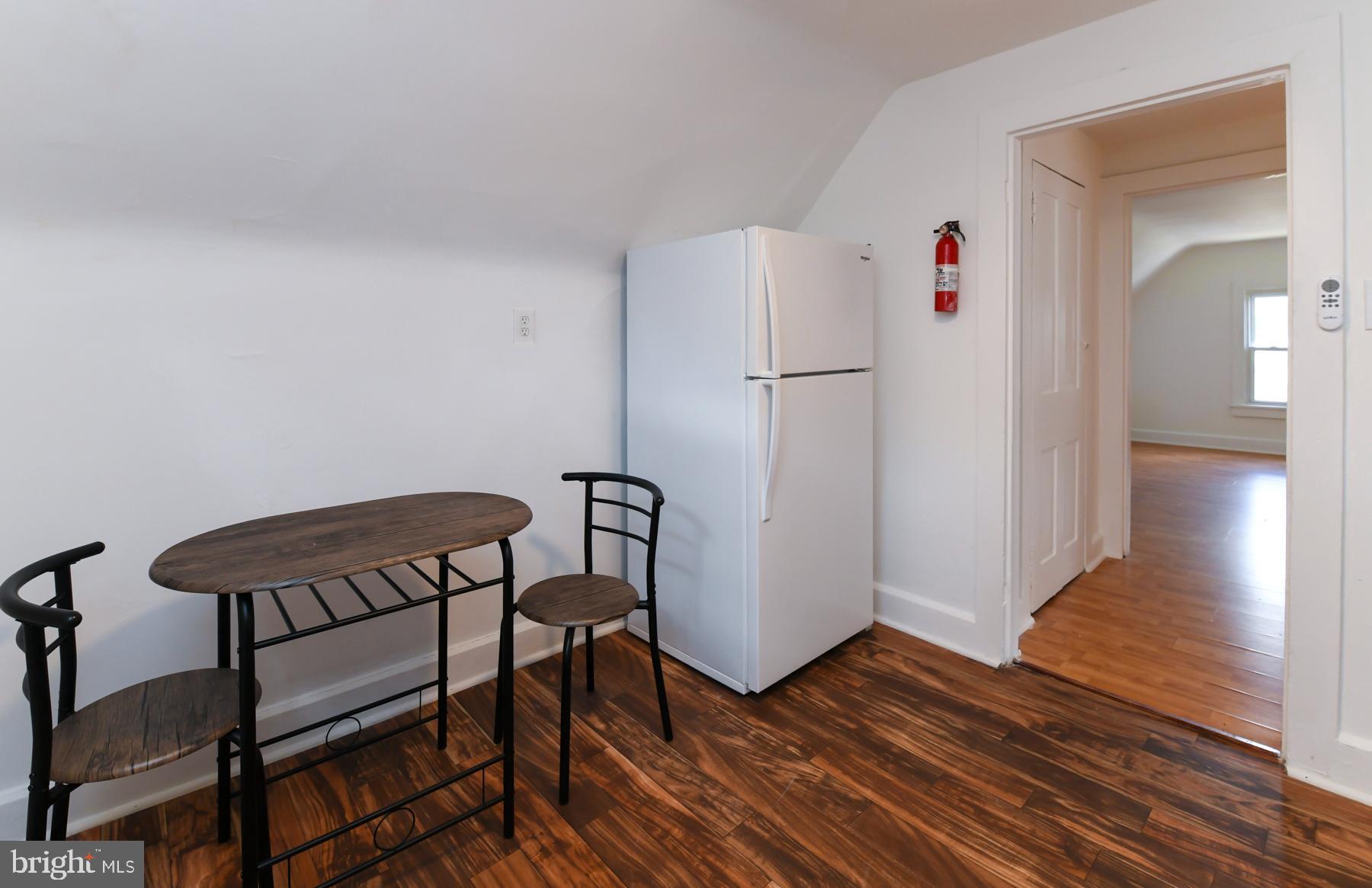53 High Street, Unit 3A Woodbury, NJ 08096 - Photo 5 of 9 a view of a livingroom with furniture and wooden floor
