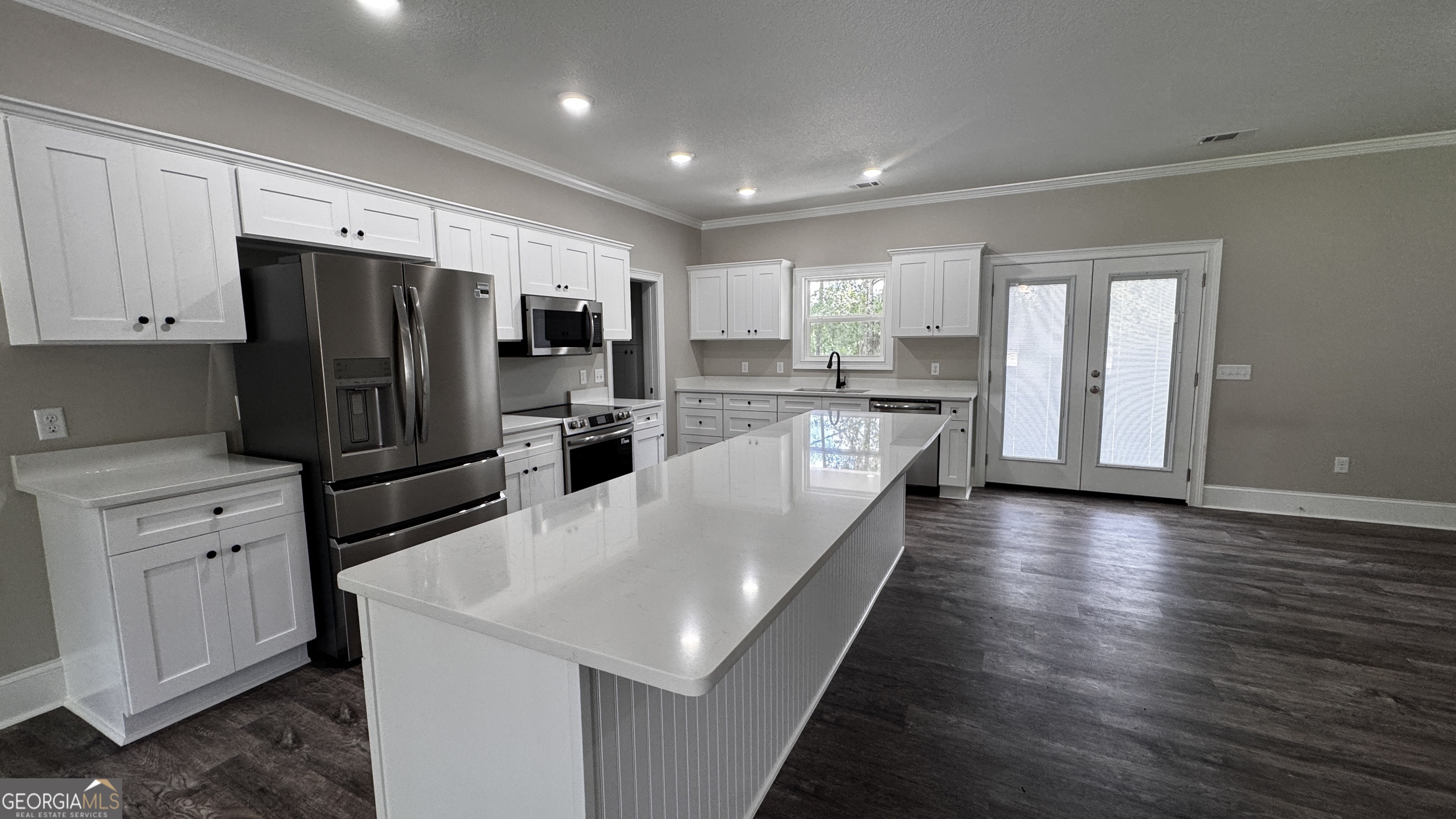 3 Willow Pointe Claxton, GA 30417 - Photo 10 of 31 a kitchen with stainless steel appliances a refrigerator stove microwave and sink