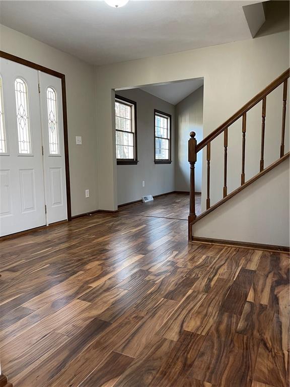 690 Adele Drive North Huntingdon, PA 15642 - Photo 14 of 25 a view of an empty room with wooden floor and a window