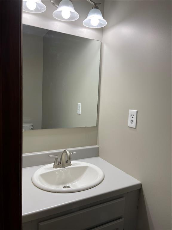 690 Adele Drive North Huntingdon, PA 15642 - Photo 15 of 25 a bathroom with a sink and a mirror
