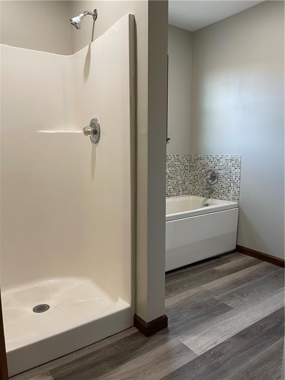 690 Adele Drive North Huntingdon, PA 15642 - Photo 22 of 25 a bathroom with a bathtub and a shower