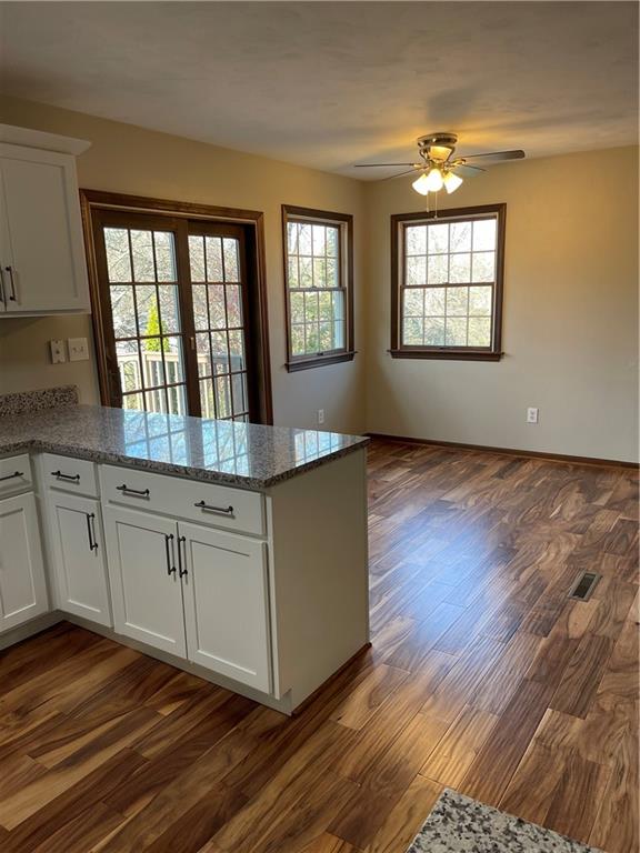 690 Adele Drive North Huntingdon, PA 15642 - Photo 8 of 25 a kitchen with stainless steel appliances granite countertop a stove a sink and a window