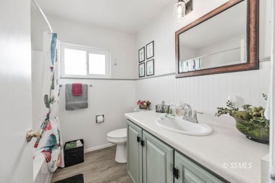 420 West Upjohn Avenue Ridgecrest, CA 93555 - Photo 12 of 32 a bathroom with a sink and a mirror