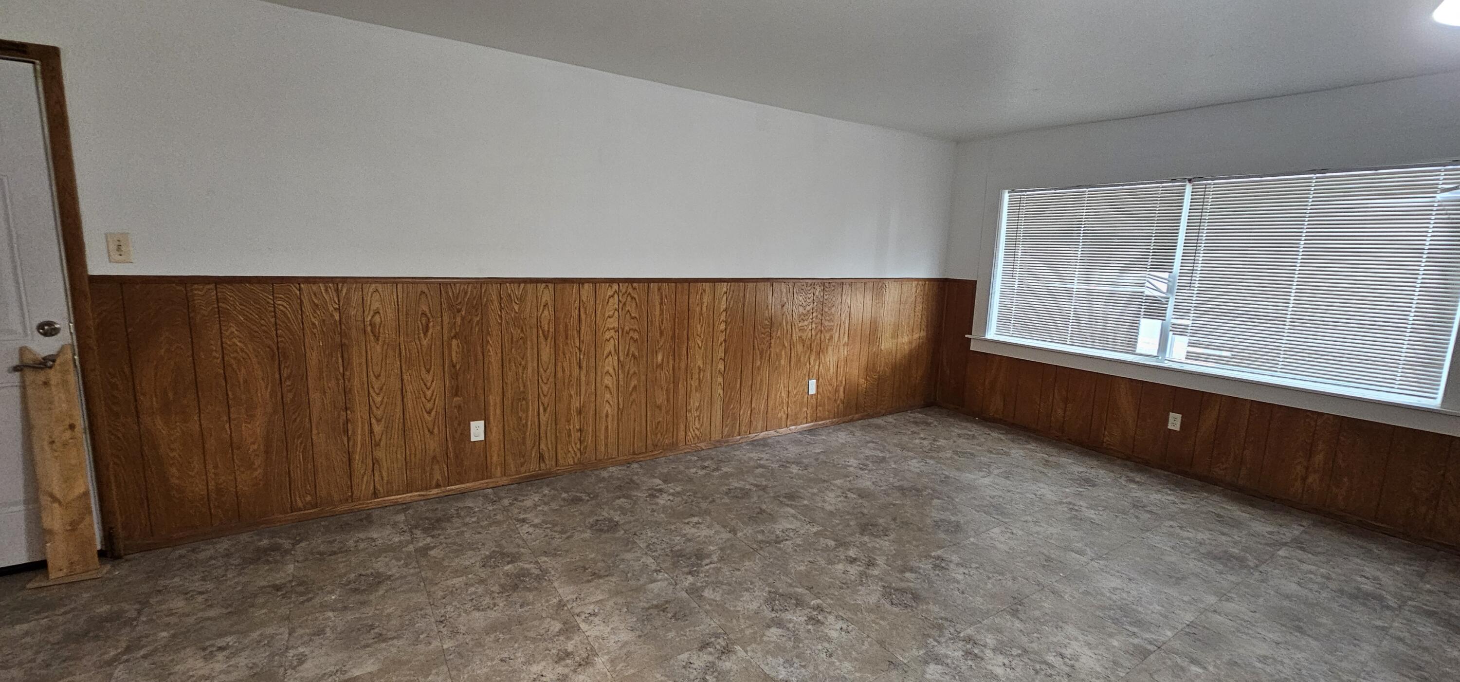 2007 62nd Street Lubbock, TX 79412 - Photo 11 of 17 an empty room with windows