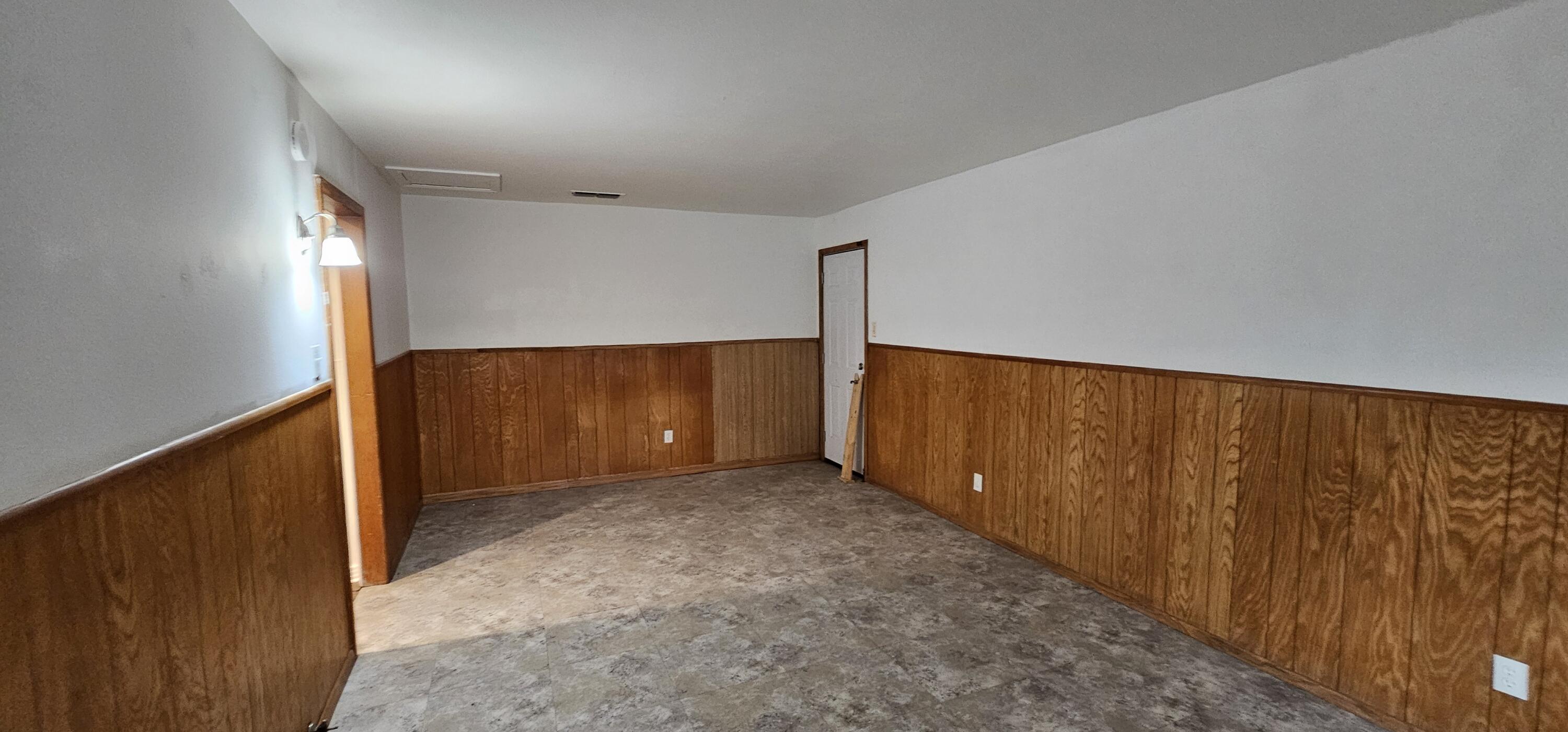 2007 62nd Street Lubbock, TX 79412 - Photo 12 of 17 an empty room with wooden floor