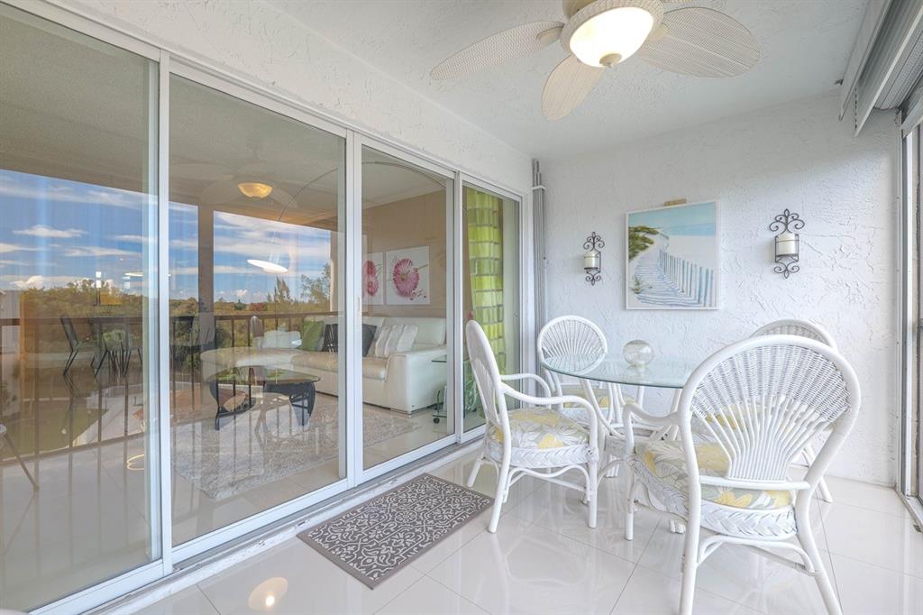3930 Inverrary Boulevard, Unit 603D Lauderhill, FL 33319 - Photo 7 of 74 a view of a dining room with furniture wooden floor and next to a window