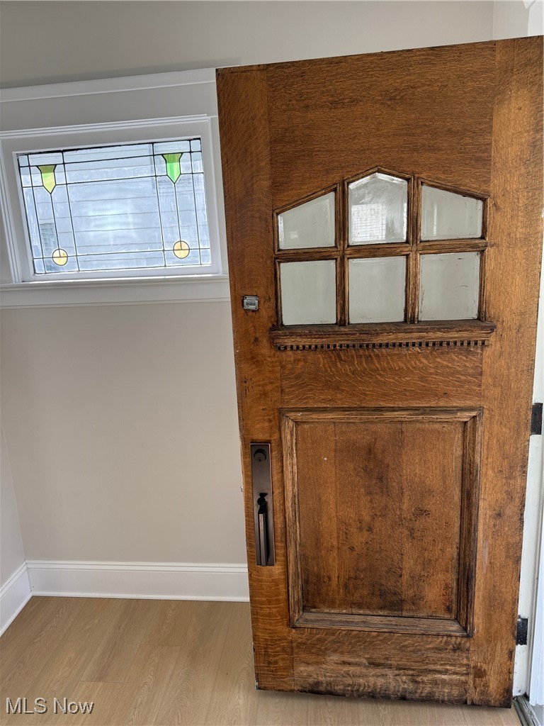 2185 Rexwood Road Cleveland, OH 44118 - Photo 21 of 26 Detailed view of baseboards and wood finished floors