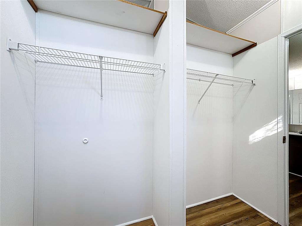 4775 Cypress Creek Ranch Road St. Cloud, FL 34773 - Photo 27 of 63 a view of a room with wooden floor