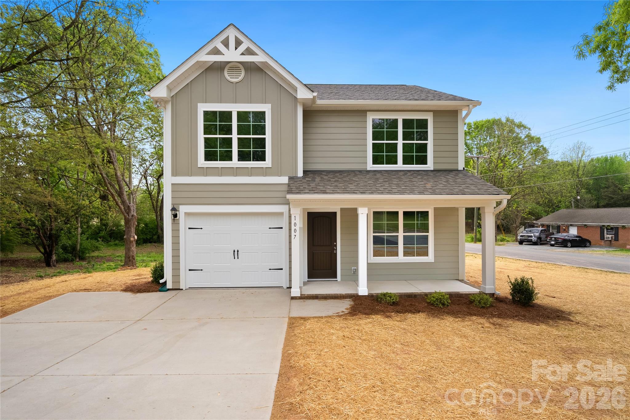 front view of a house with a yard