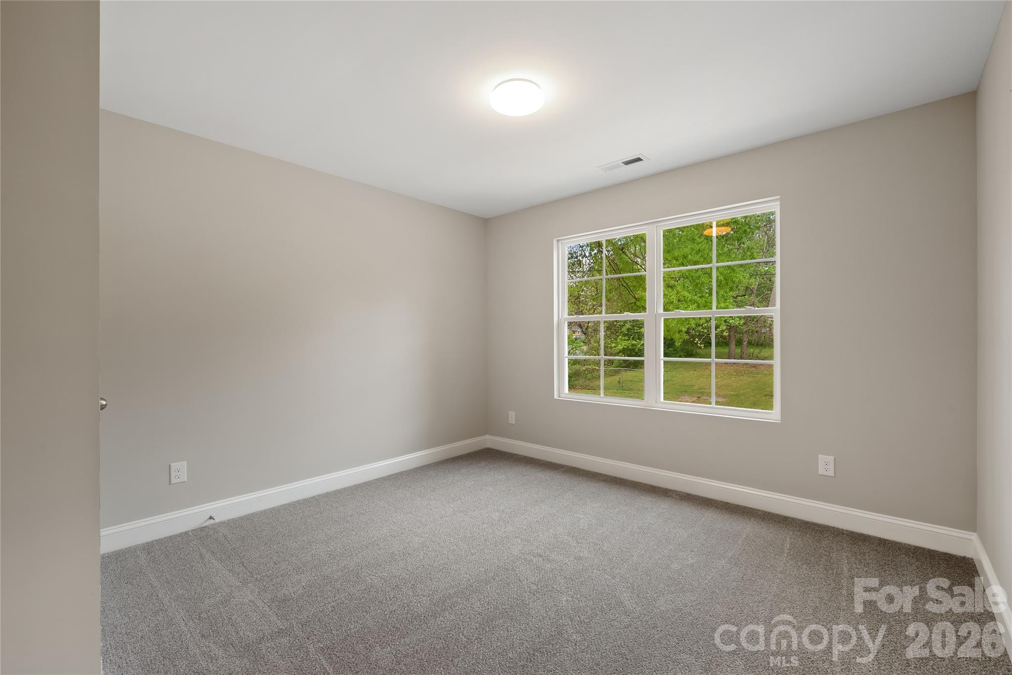 1007 Sioux Street Monroe, NC 28110 - Photo 17 of 39 an empty room with a window