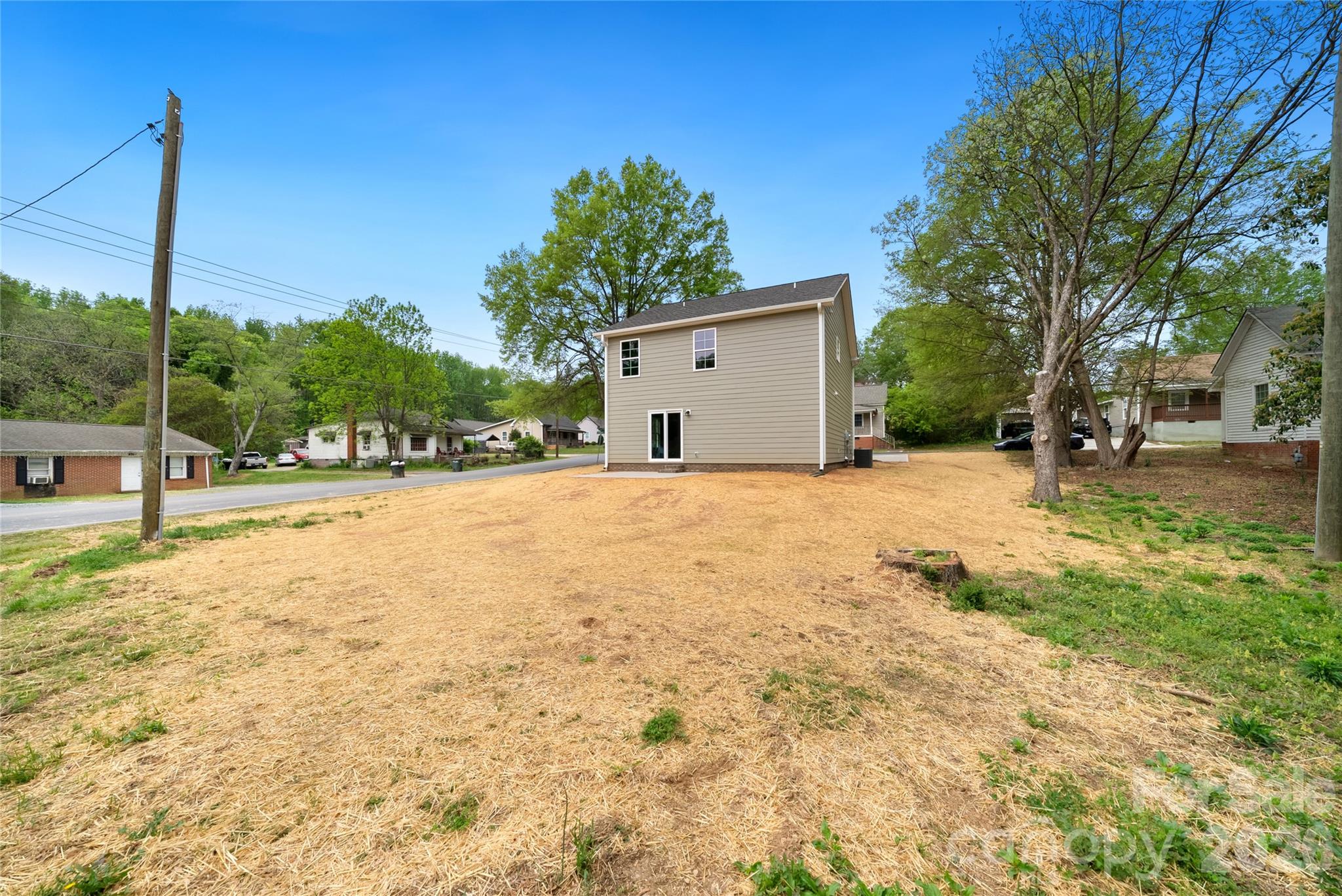 1007 Sioux Street Monroe, NC 28110 - Photo 31 of 39 a view of a house with a yard