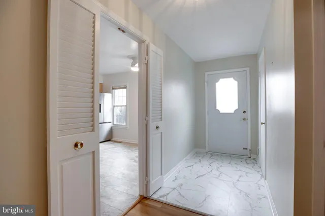 a kitchen with stainless steel appliances granite countertop a stove and a refrigerator