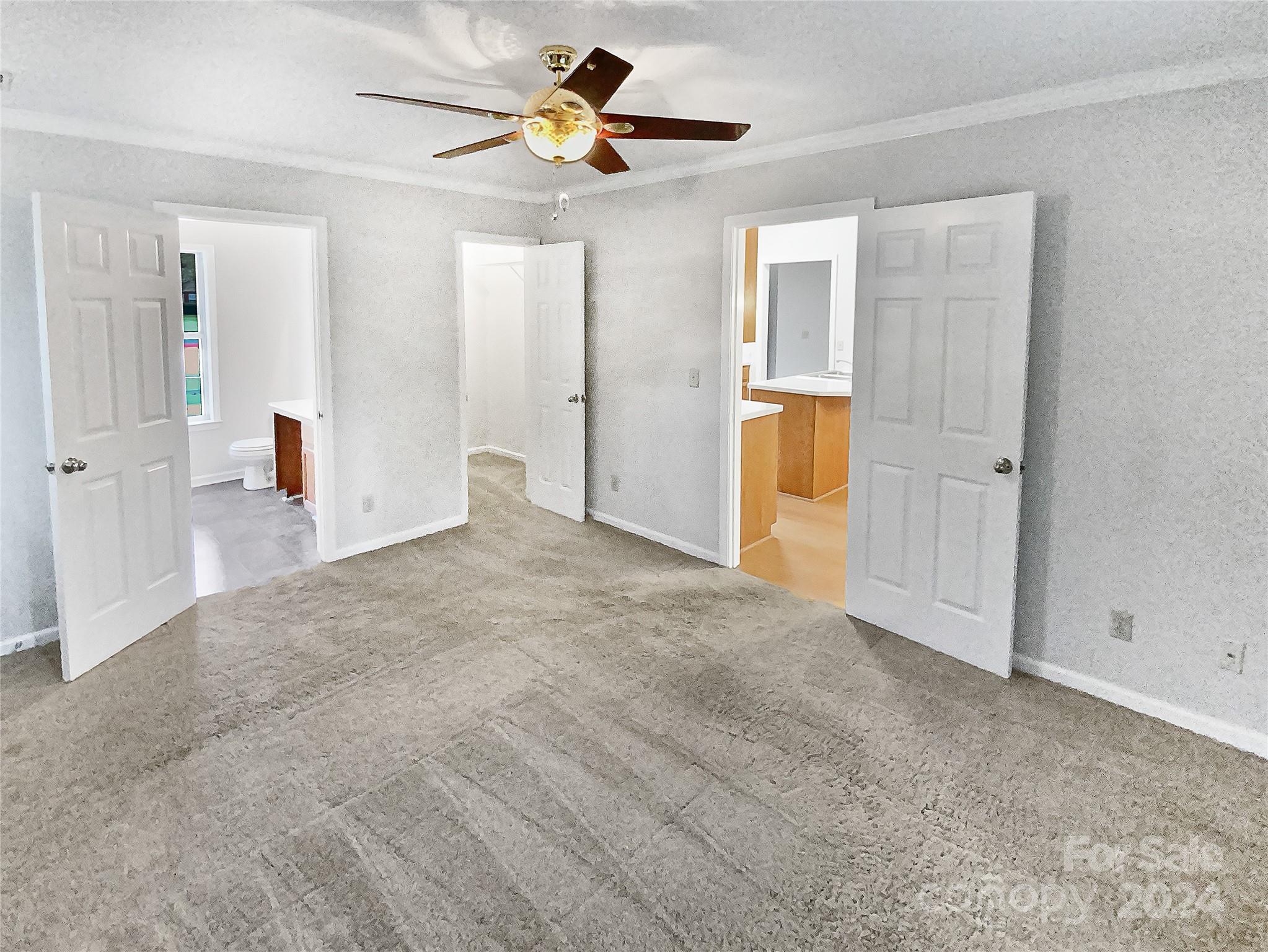1150 Phillip Street Salisbury, NC 28147 - Photo 16 of 22 a view of a livingroom with a flat screen tv and kitchen space