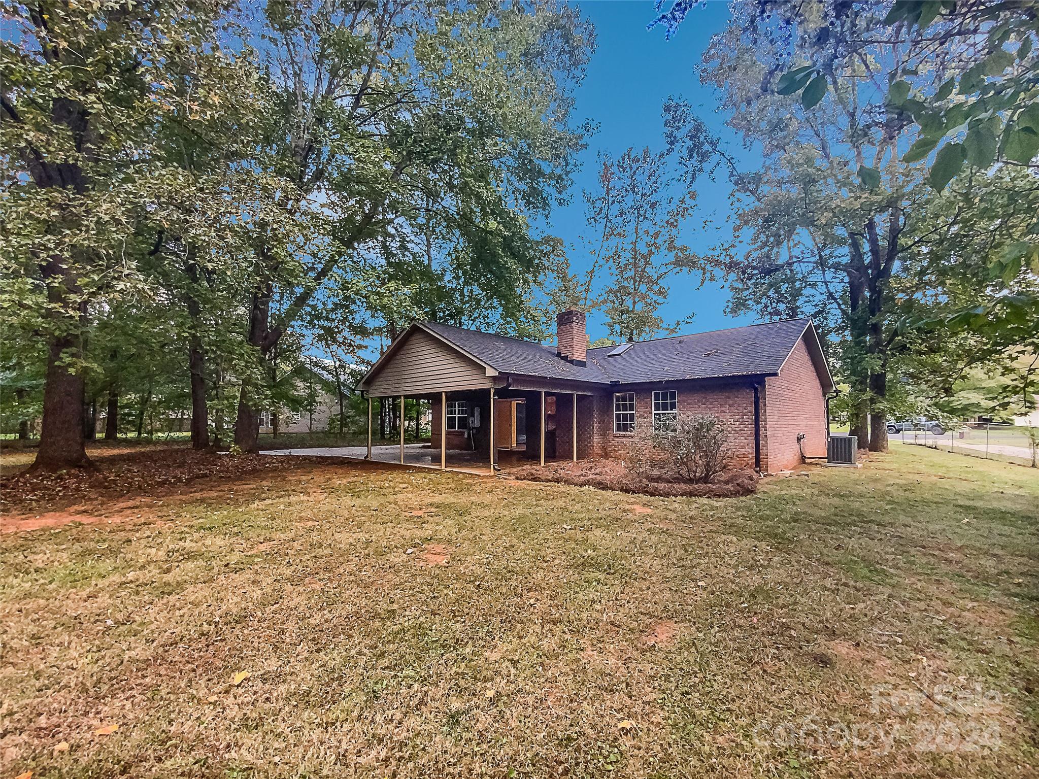 1150 Phillip Street Salisbury, NC 28147 - Photo 20 of 22 a front view of a house with a garden