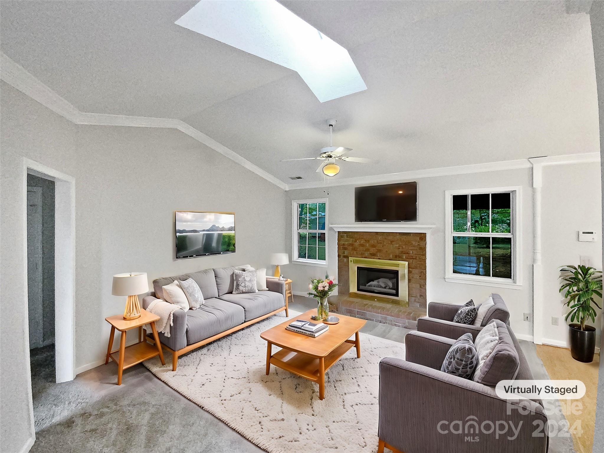 1150 Phillip Street Salisbury, NC 28147 - Photo 2 of 22 a living room with furniture and a fireplace