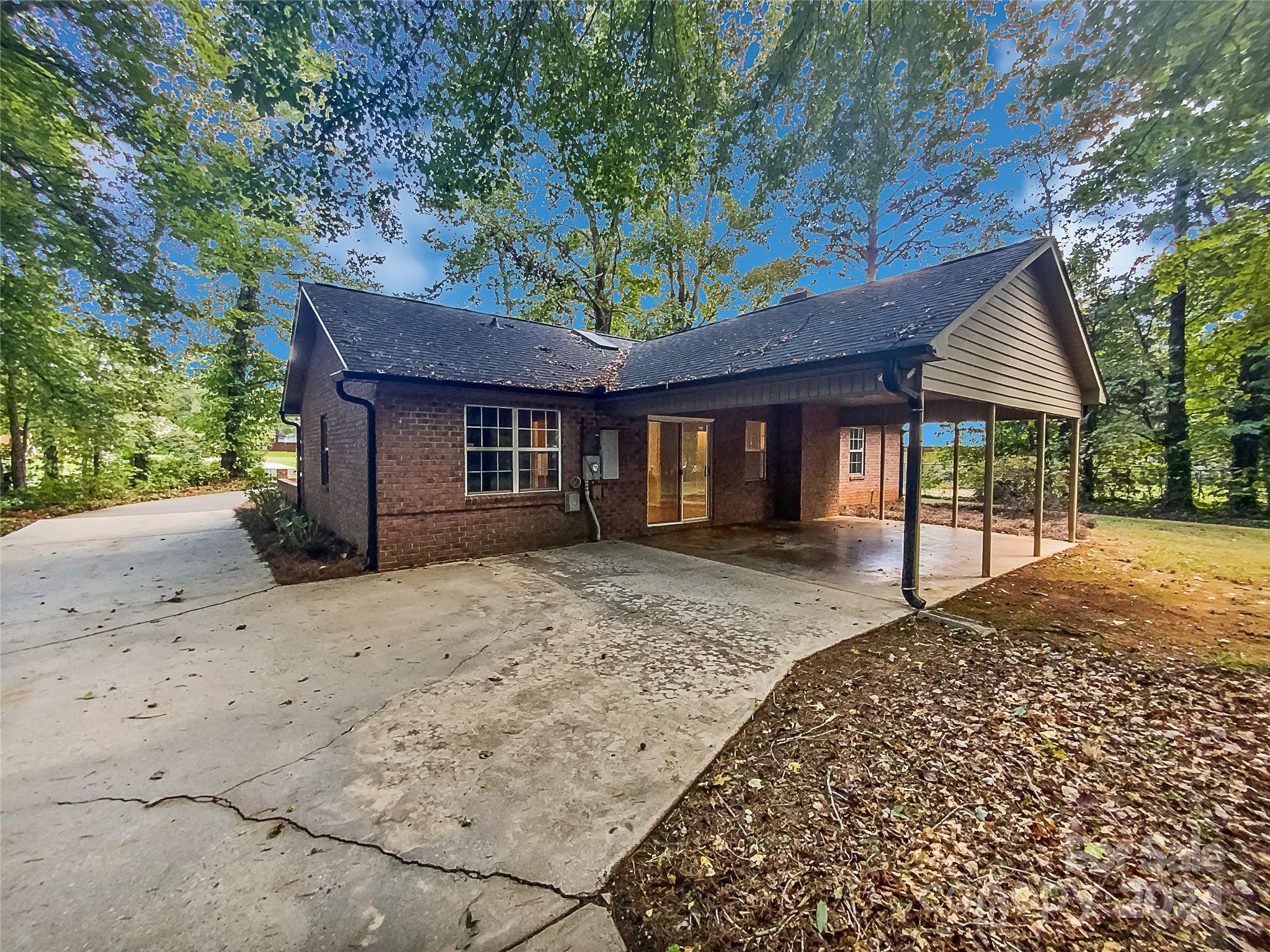 1150 Phillip Street Salisbury, NC 28147 - Photo 21 of 22 a front view of a house with a garden