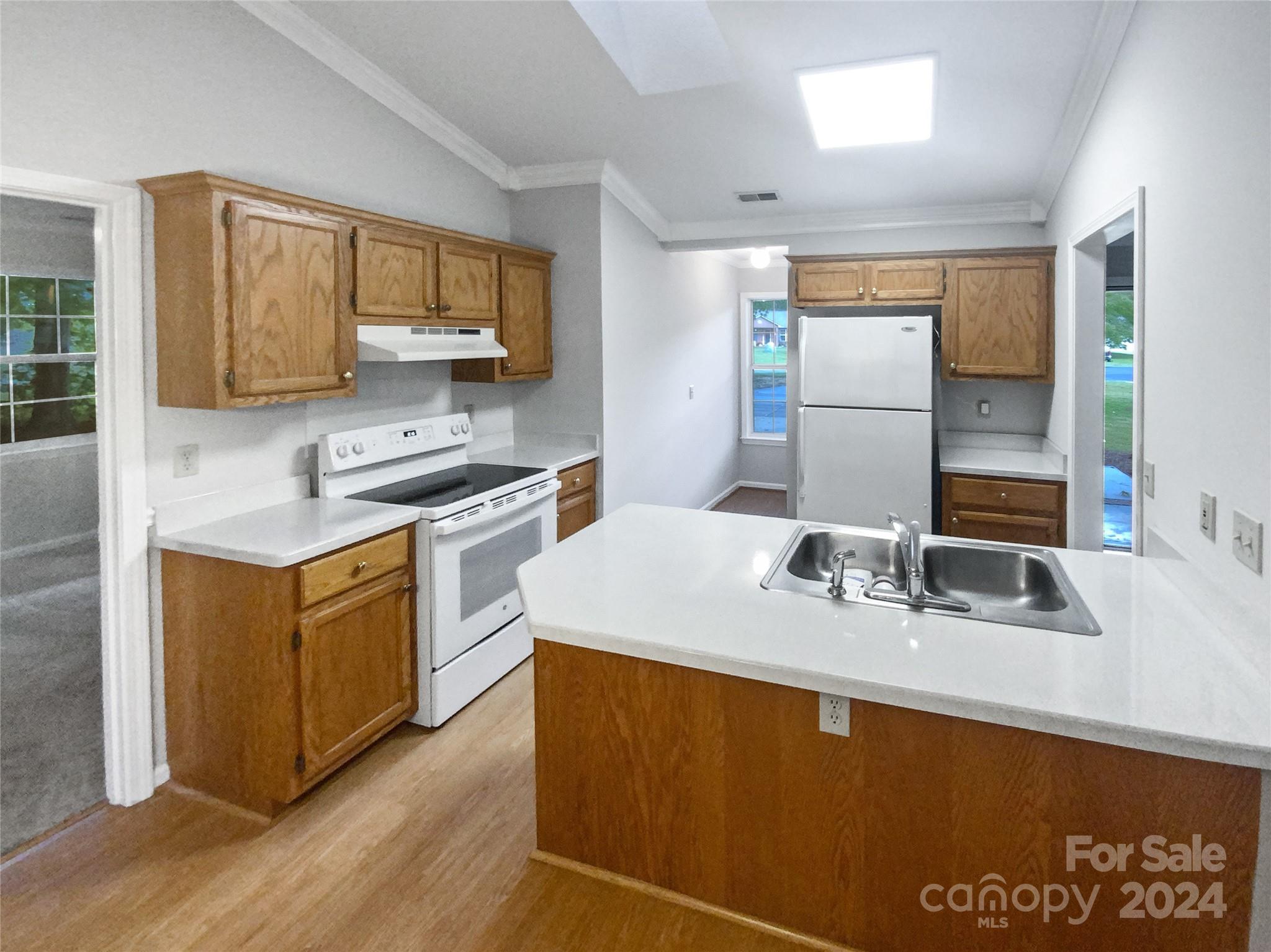 1150 Phillip Street Salisbury, NC 28147 - Photo 6 of 22 a kitchen with stainless steel appliances granite countertop a sink stove and refrigerator