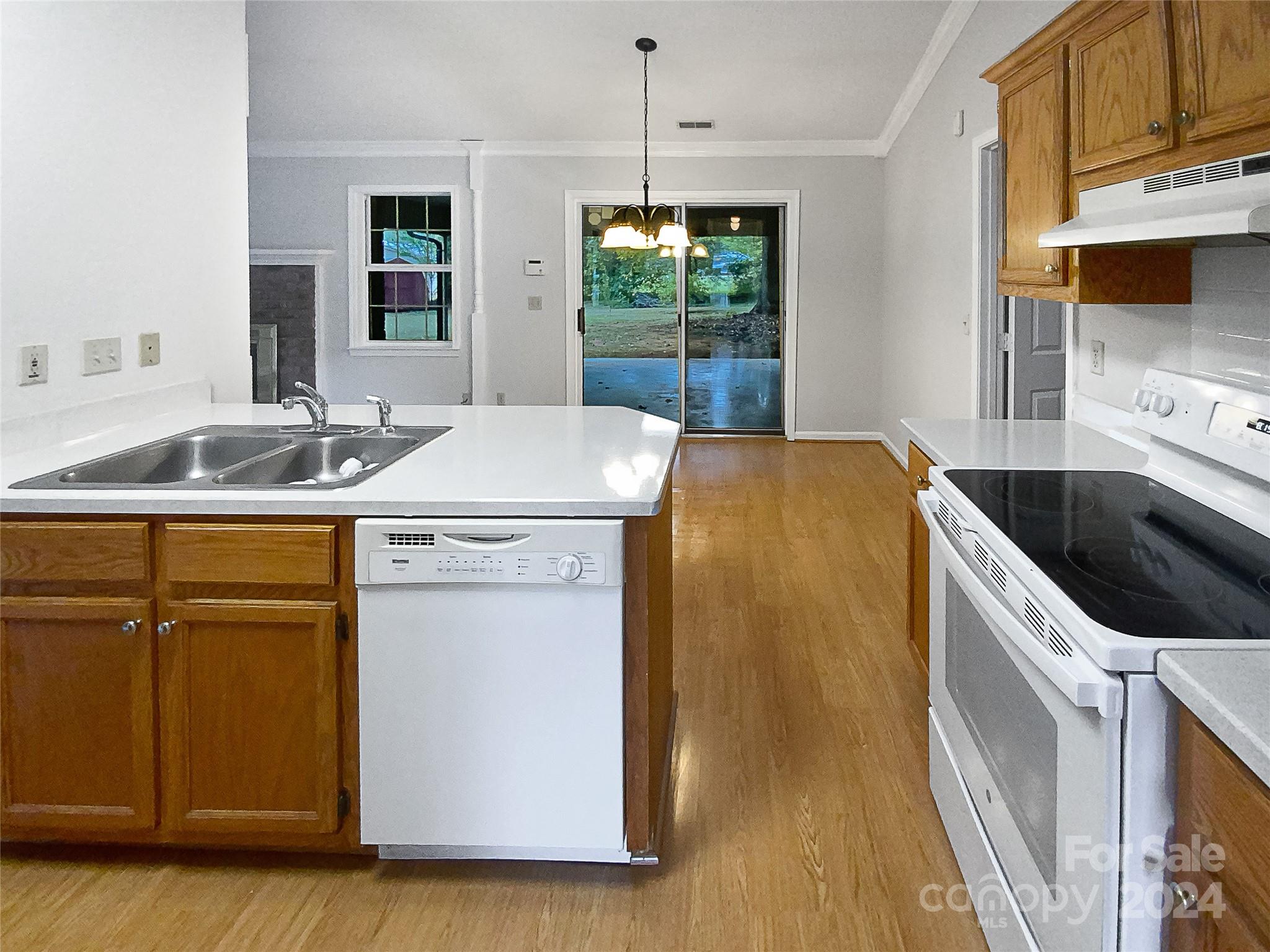 1150 Phillip Street Salisbury, NC 28147 - Photo 9 of 22 a kitchen that has a sink and a stove in it