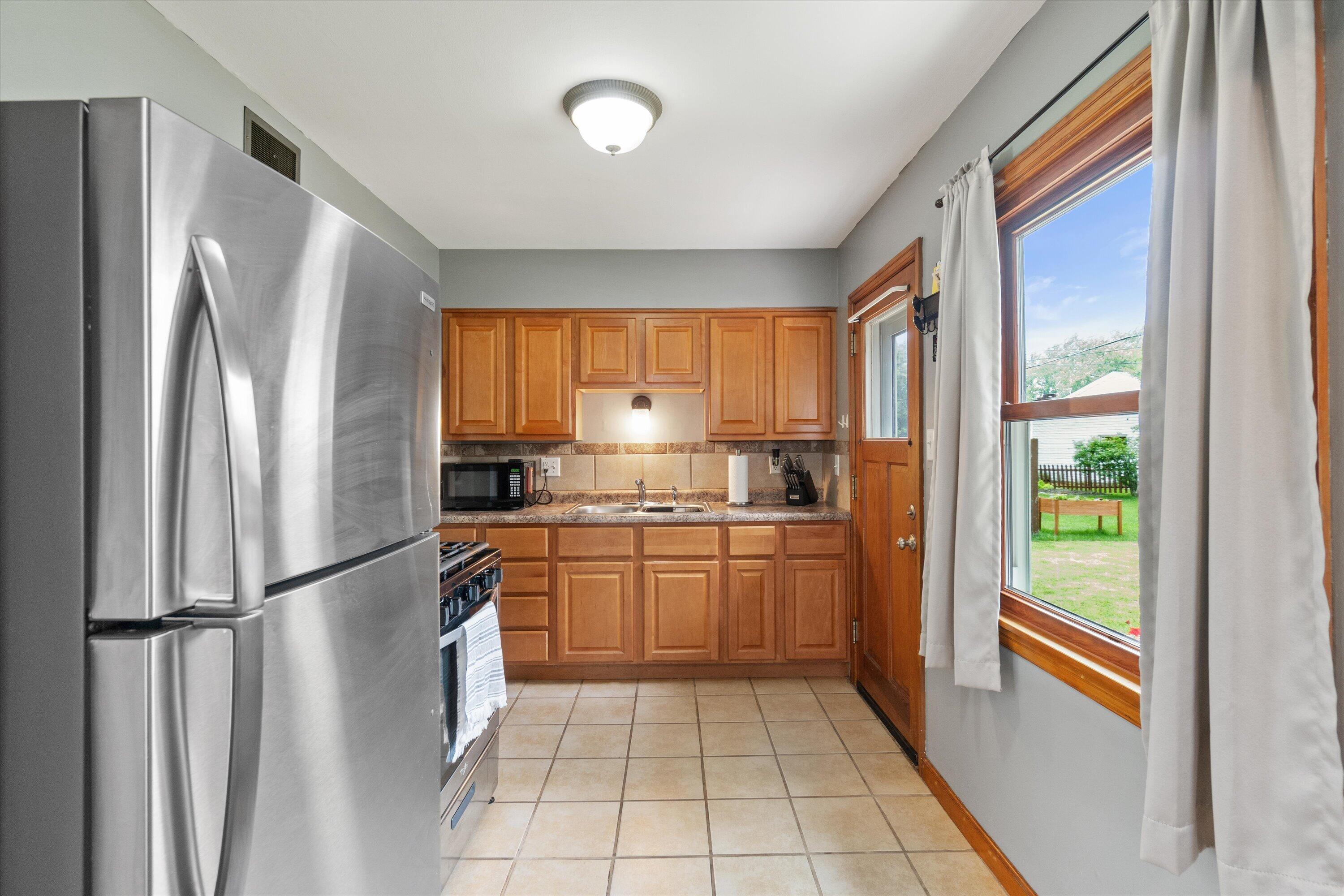 4342 Glenway Street Wauwatosa, WI 53222 - Photo 16 of 27 Tile kitchen floor