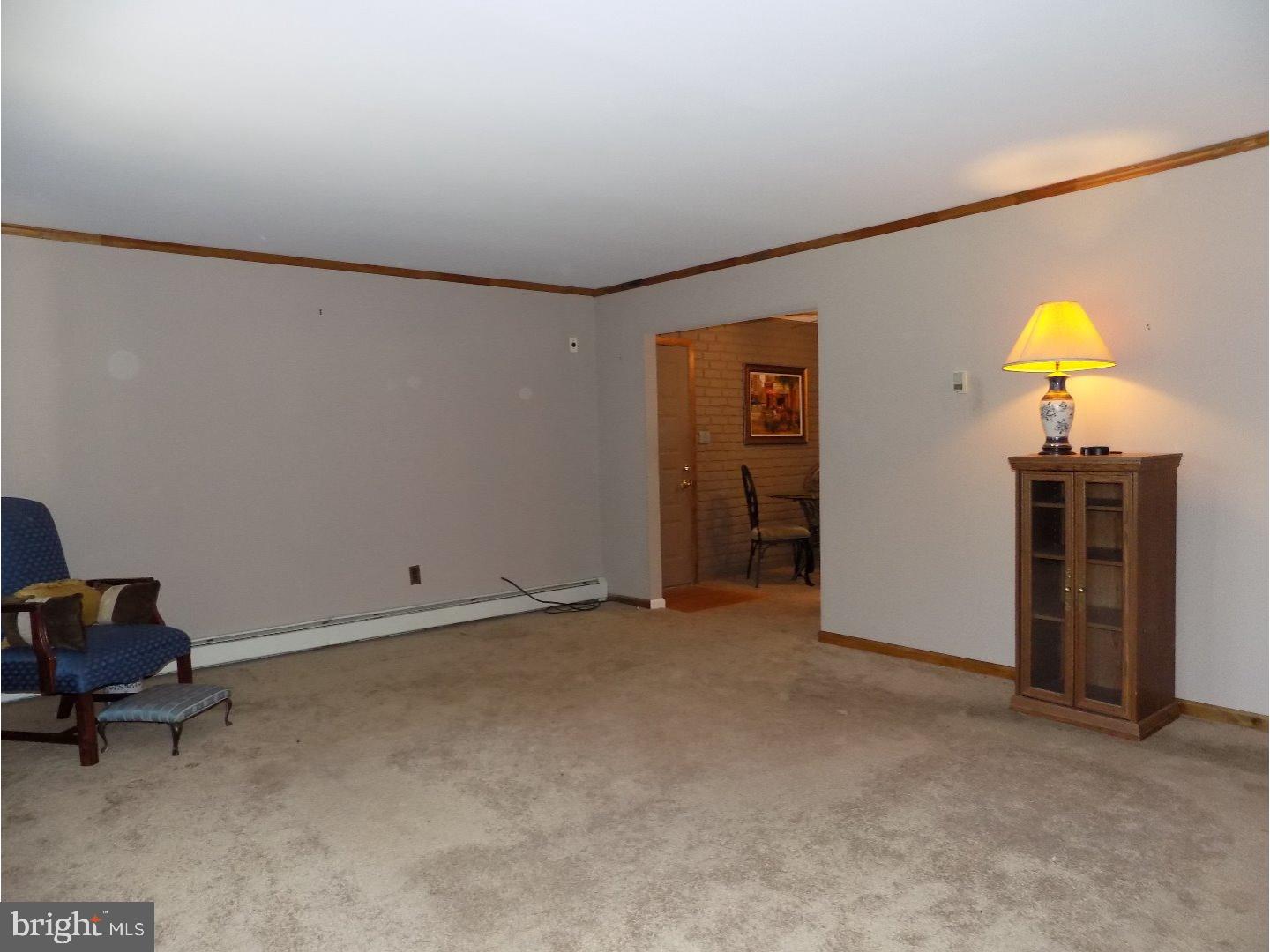 9 Circle Road Levittown, PA 19057 - Photo 5 of 22 a view of a livingroom with natural light