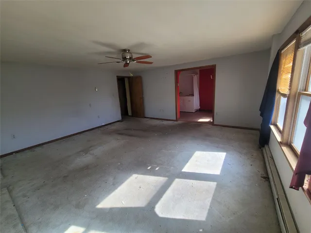 an empty room with windows