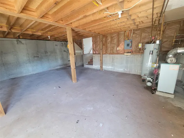 a view of a room with wooden walls