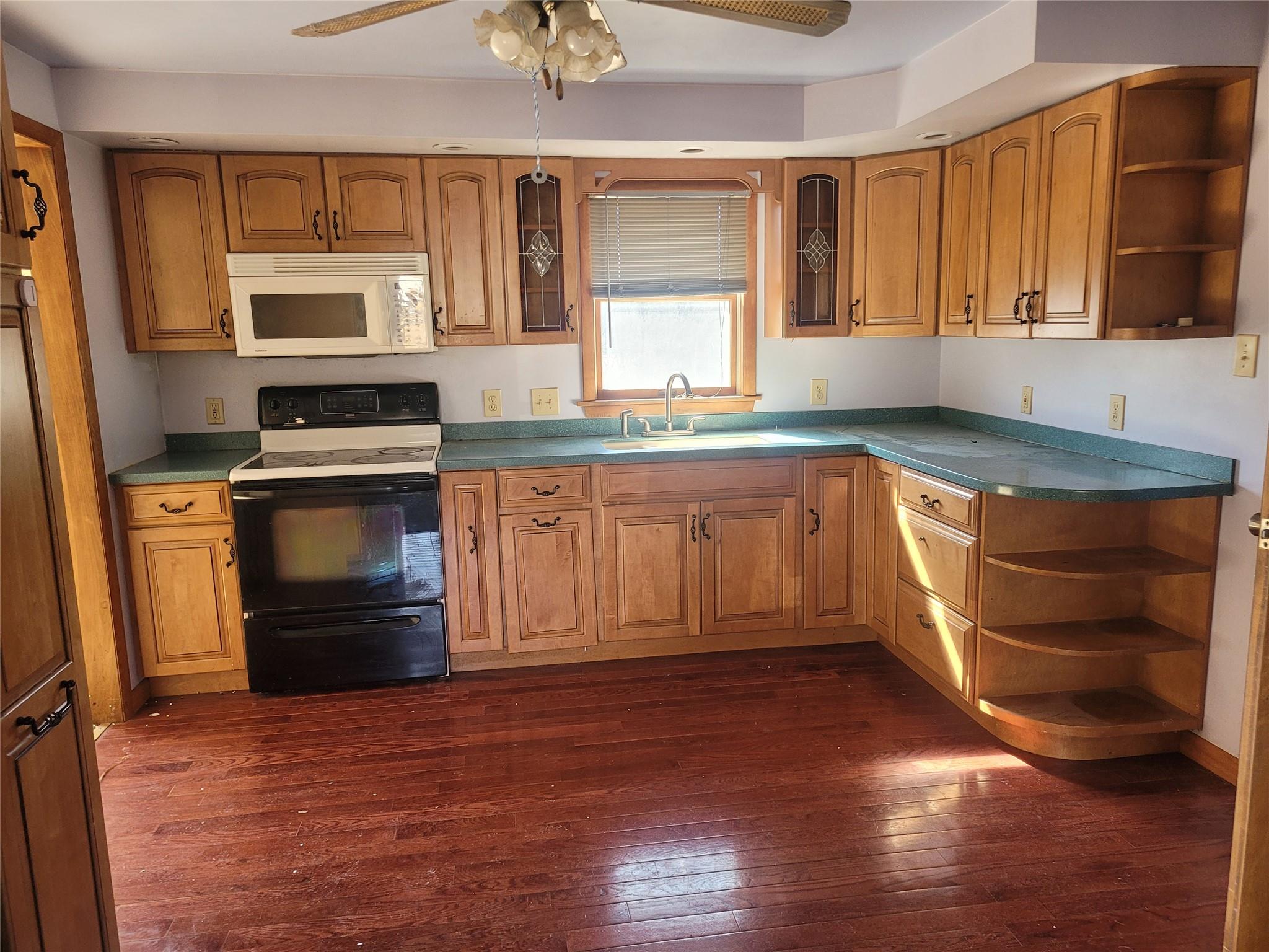26 Rolling Meadows Road Livingston Manor, NY 12758 - Photo 4 of 19 a kitchen with granite countertop a stove and a sink