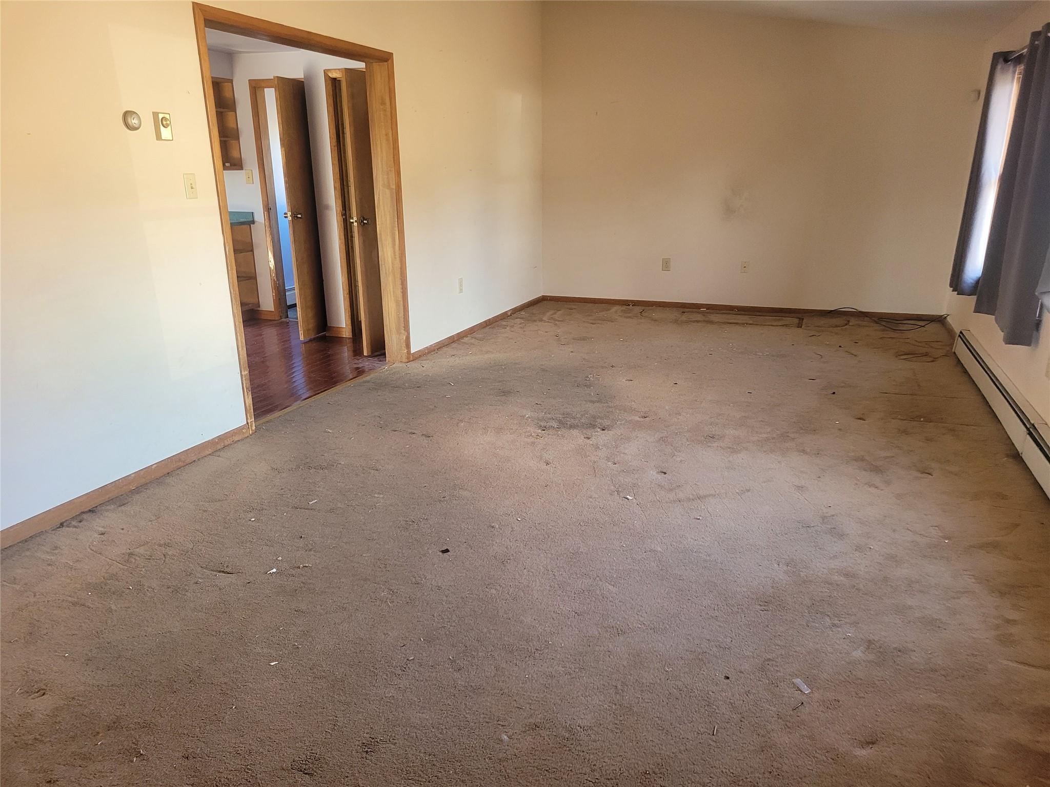 26 Rolling Meadows Road Livingston Manor, NY 12758 - Photo 6 of 19 an empty room with a mirror