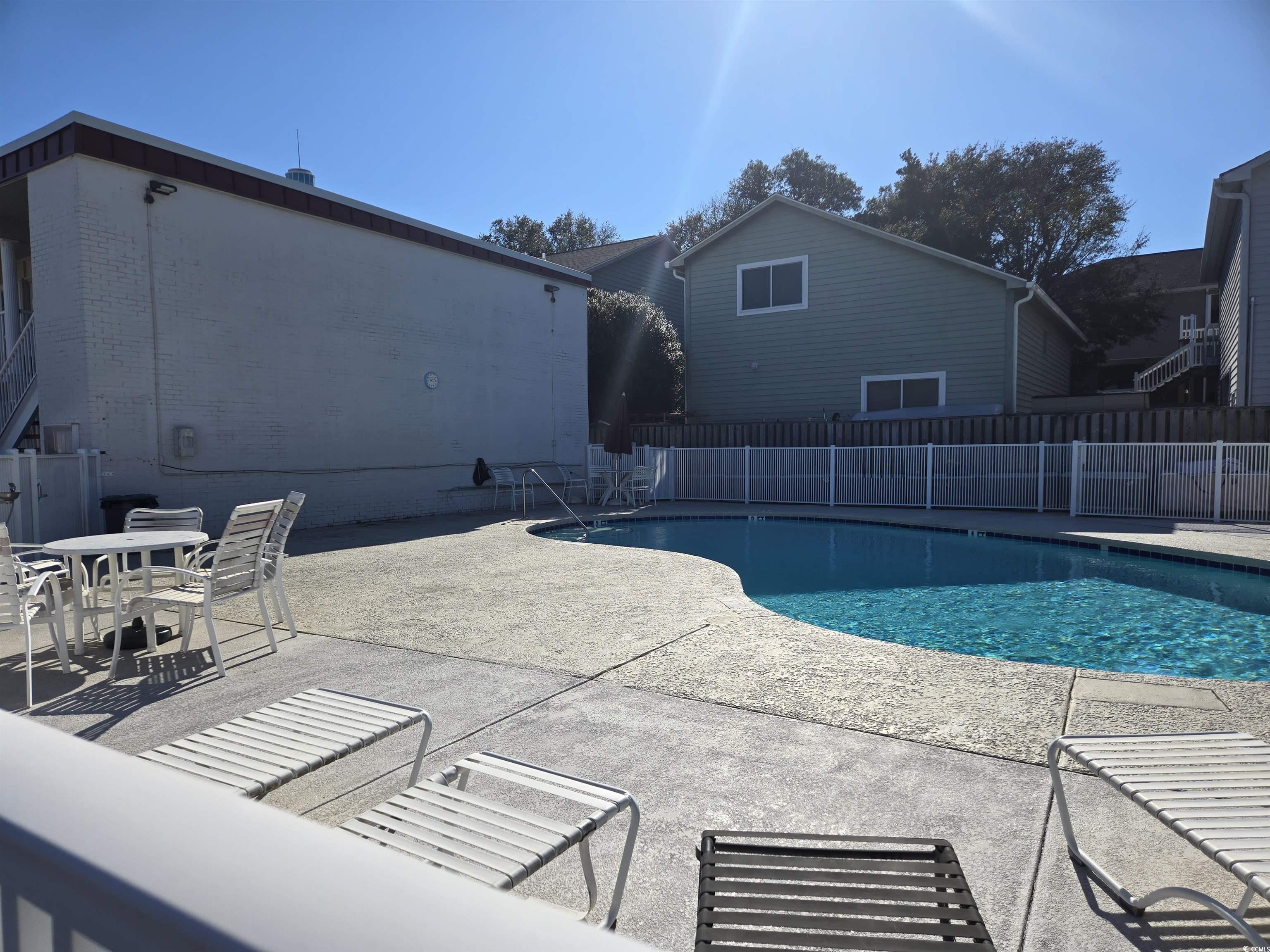 2204 Perrin Drive, Unit 3 North Myrtle Beach, SC 29582 - Photo 11 of 39 View of pool featuring a patio