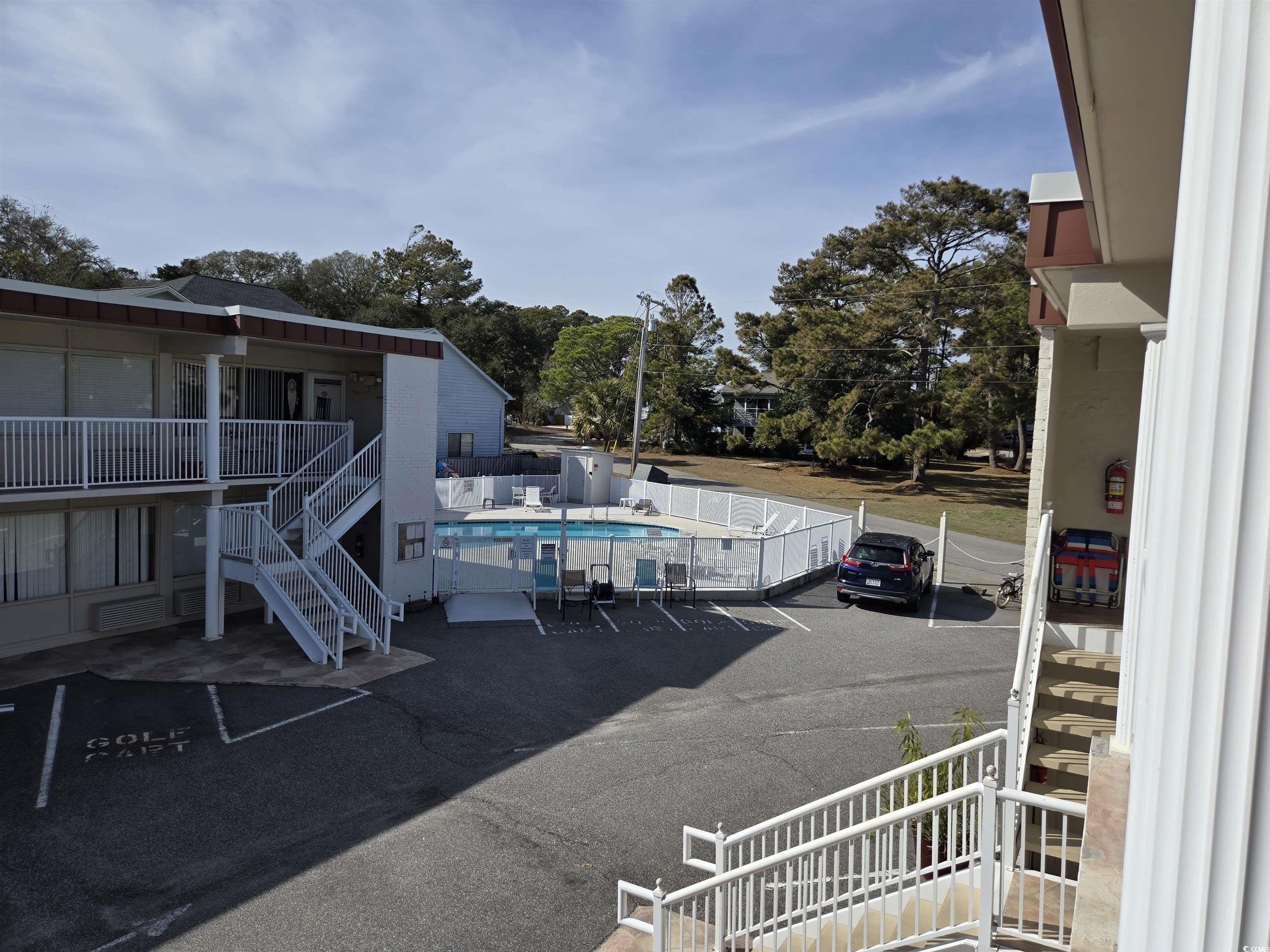 2204 Perrin Drive, Unit 3 North Myrtle Beach, SC 29582 - Photo 29 of 39 Exterior space with a community pool