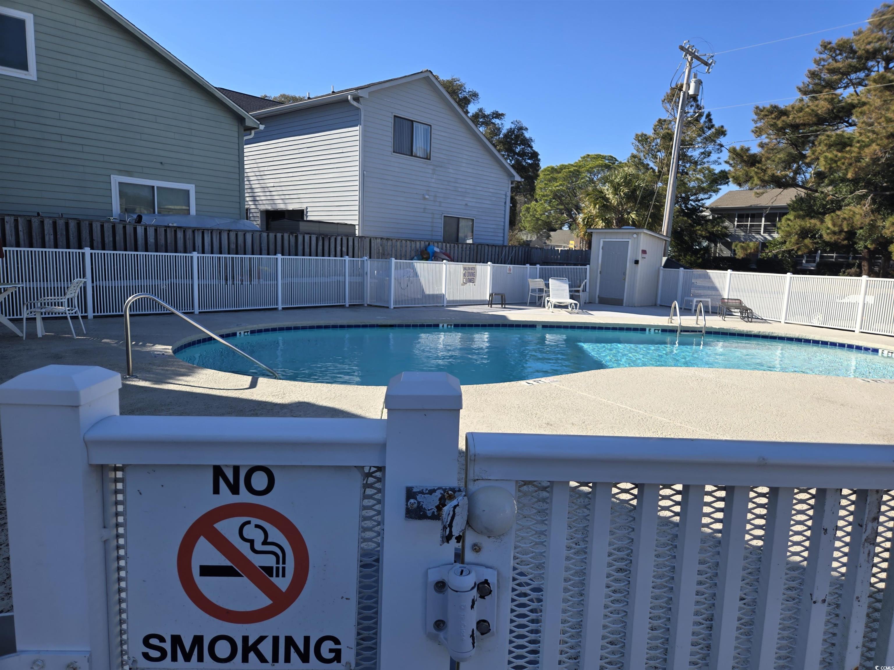 2204 Perrin Drive, Unit 3 North Myrtle Beach, SC 29582 - Photo 9 of 39 View of pool featuring a patio area