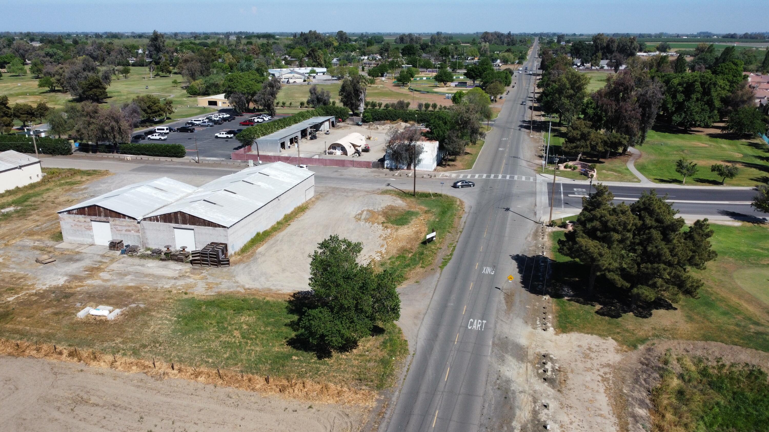 898 Champion Street Lemoore, CA 93245 - Photo 2 of 5 an aerial view of residential house with outdoor space