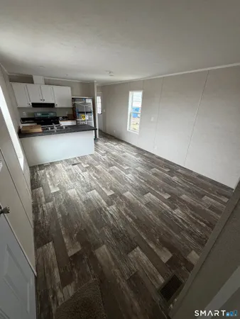 a view of kitchen and microwave