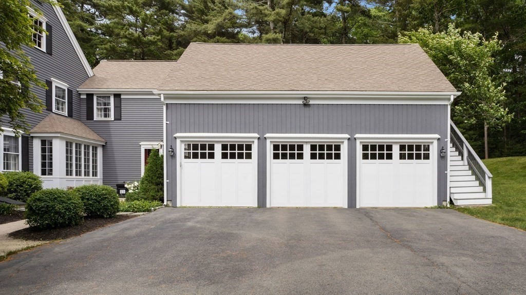 18 Pine Street Dover, MA 02030 - Photo 16 of 20 a aerial view of a house with a yard and garage