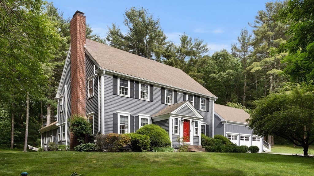 18 Pine Street Dover, MA 02030 - Photo 17 of 20 a aerial view of a house next to a big yard and large trees