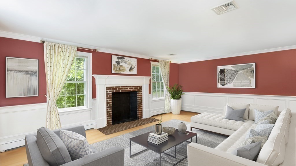 18 Pine Street Dover, MA 02030 - Photo 2 of 20 a living room with furniture and a fireplace