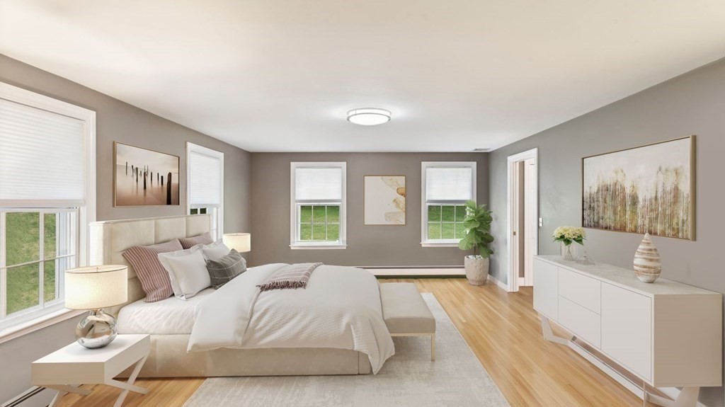 18 Pine Street Dover, MA 02030 - Photo 8 of 20 a spacious bedroom with a large bed and a large window