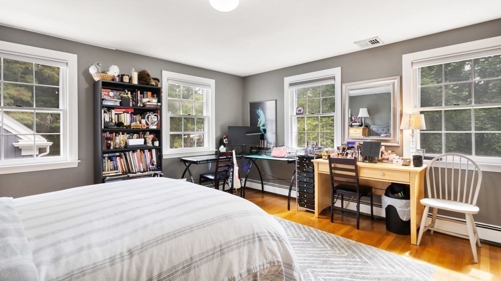 18 Pine Street Dover, MA 02030 - Photo 9 of 20 a bedroom with a bed and a large window